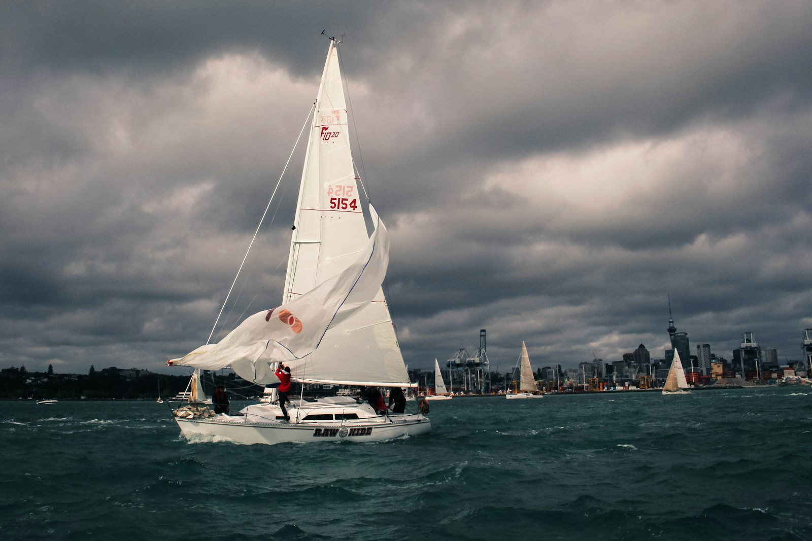 white sailboat on body of water