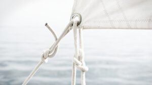 a white sail with a knot on it